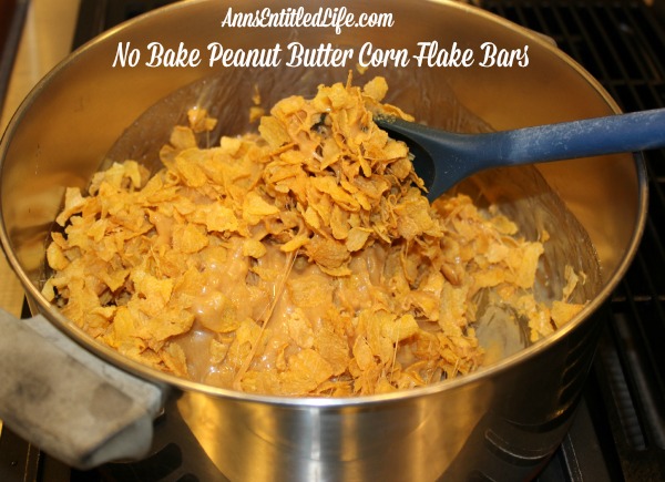 No Bake Peanut Butter Corn Flake Bars Recipe. Mix up a batch of these old-fashioned No Bake Peanut Butter Corn Flake Bars on a hot summer day.  Fast and simple to make, your family will love every delicious bite!