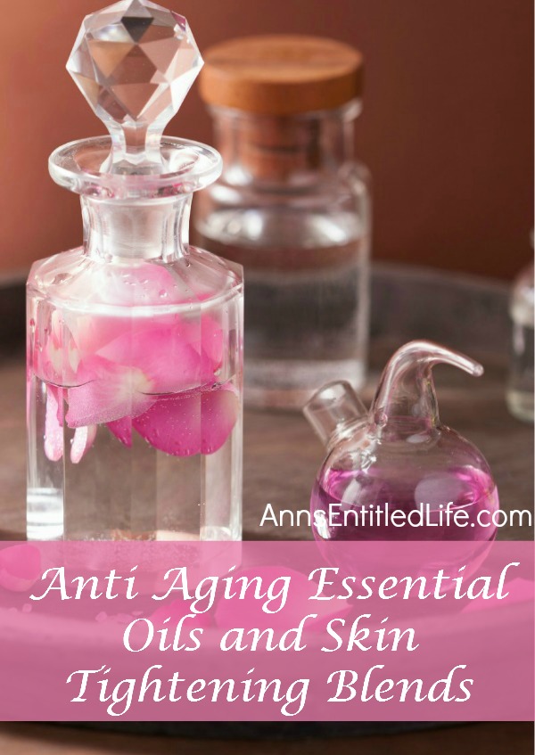 Lotion bottles filled with clear oils and pink flowers