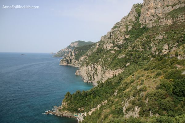 The Amalfi Coast, Italy; The Amalfi Coast is a stretch of coastline on the southern coast of the Sorrentine Peninsula in the Province of Salerno in Southern Italy. Known for hosting the rich and famous, Amalfi is beautiful, fairly isolated, and crowded!