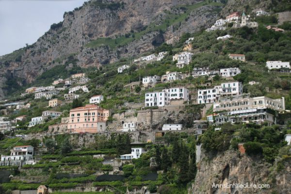 The Amalfi Coast, Italy; The Amalfi Coast is a stretch of coastline on the southern coast of the Sorrentine Peninsula in the Province of Salerno in Southern Italy. Known for hosting the rich and famous, Amalfi is beautiful, fairly isolated, and crowded!