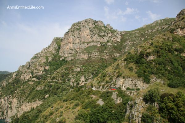 The Amalfi Coast, Italy; The Amalfi Coast is a stretch of coastline on the southern coast of the Sorrentine Peninsula in the Province of Salerno in Southern Italy. Known for hosting the rich and famous, Amalfi is beautiful, fairly isolated, and crowded!