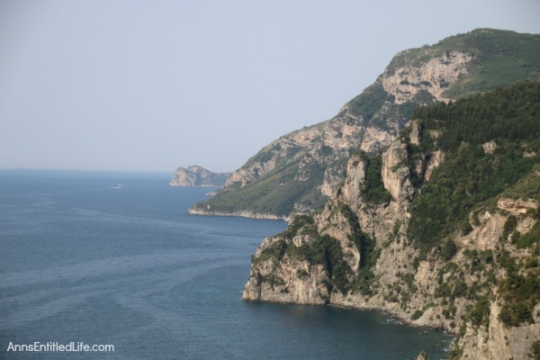 The Amalfi Coast, Italy; The Amalfi Coast is a stretch of coastline on the southern coast of the Sorrentine Peninsula in the Province of Salerno in Southern Italy. Known for hosting the rich and famous, Amalfi is beautiful, fairly isolated, and crowded!