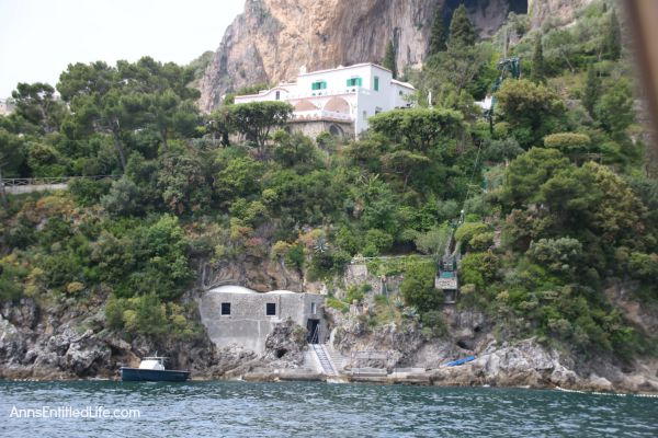 The Amalfi Coast, Italy; The Amalfi Coast is a stretch of coastline on the southern coast of the Sorrentine Peninsula in the Province of Salerno in Southern Italy. Known for hosting the rich and famous, Amalfi is beautiful, fairly isolated, and crowded!