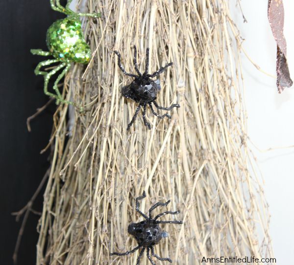 Easy DIY Halloween Glitter Witch’s Broomstick; simple and fun to make Halloween Witch's Glitter Broomstick Tutorial DIY project. With just an hour of your time, and you have a wonderful 6 foot tall witch broomstick to make your Halloween decor, or costume, complete!