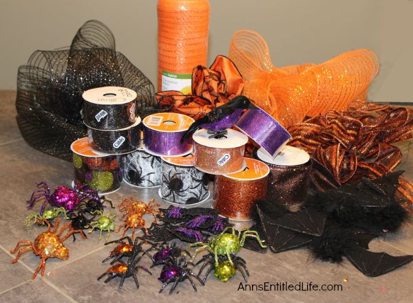 Easy DIY Halloween Glitter Witch’s Broomstick; simple and fun to make Halloween Witch's Glitter Broomstick Tutorial DIY project. With just an hour of your time, and you have a wonderful 6 foot tall witch broomstick to make your Halloween decor, or costume, complete!