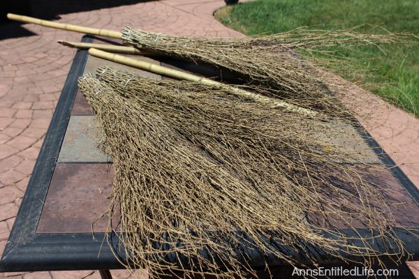 Easy DIY Halloween Glitter Witch’s Broomstick; simple and fun to make Halloween Witch's Glitter Broomstick Tutorial DIY project. With just an hour of your time, and you have a wonderful 6 foot tall witch broomstick to make your Halloween decor, or costume, complete!