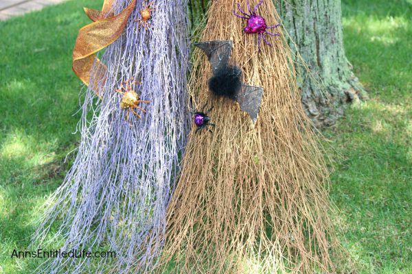 Easy DIY Halloween Glitter Witch’s Broomstick; simple and fun to make Halloween Witch's Glitter Broomstick Tutorial DIY project. With just an hour of your time, and you have a wonderful 6 foot tall witch broomstick to make your Halloween decor, or costume, complete!