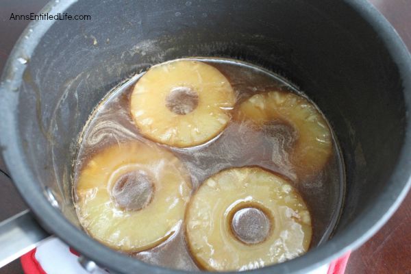 Pineapple Upside Down Cake Recipe; Old fashioned Pineapple Upside Down Cake finished with a dark rum sauce; there is nothing better for a snack or to finish off a meal, or a sweet treat for breakfast in the morning!