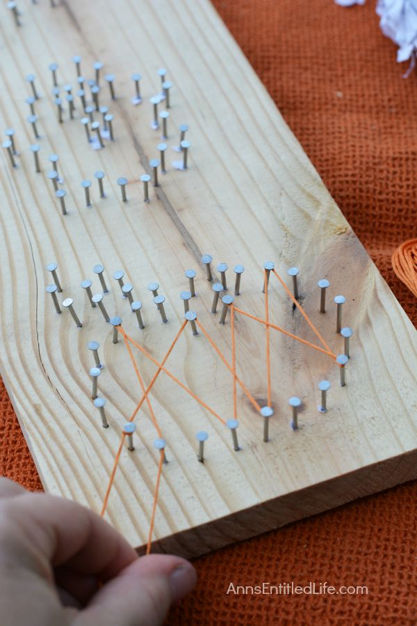 DIY Halloween String Art Trio: Ghost, Pumpkin and Bat; Halloween doesn't have to be spooktacular, sometimes it can be cute and whimsical. The ghost, pumpkin and bat in this string art project work well as a grown-up Halloween art project that is a touch fanciful.