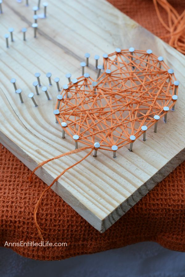 DIY Halloween String Art Trio: Ghost, Pumpkin and Bat; Halloween doesn't have to be spooktacular, sometimes it can be cute and whimsical. The ghost, pumpkin and bat in this string art project work well as a grown-up Halloween art project that is a touch fanciful.