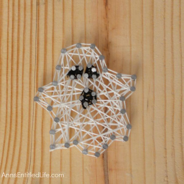 DIY Halloween String Art Trio: Ghost, Pumpkin and Bat; Halloween doesn't have to be spooktacular, sometimes it can be cute and whimsical. The ghost, pumpkin and bat in this string art project work well as a grown-up Halloween art project that is a touch fanciful.