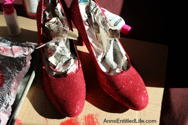 How To Easily Make Your Own Beautiful Ruby Glitter Slippers; ever wanted to own Dorthy from the Wizard of Oz Ruby Slippers? Well now you can make your own ruby slippers employing these simple step by step instructions. Using these easy how-to instructions you can make your own inexpensive, beautiful ruby red slippers with glitter and paint to for wear or for decor.  Also included, how to make your own glitter sneakers! You will love them!