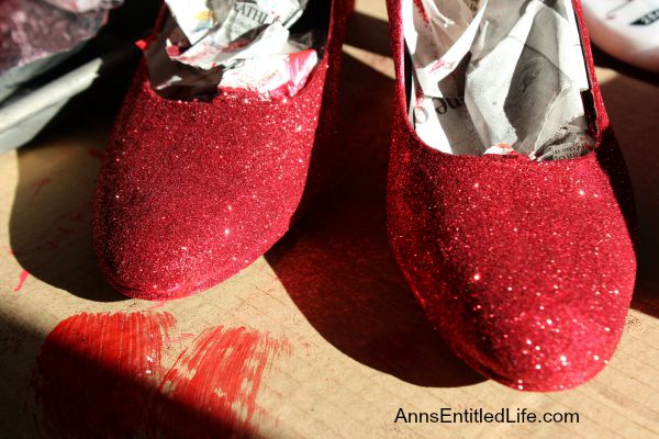 How To Easily Make Your Own Beautiful Ruby Glitter Slippers; ever wanted to own Dorthy from the Wizard of Oz Ruby Slippers? Well now you can make your own ruby slippers employing these simple step by step instructions. Using these easy how-to instructions you can make your own inexpensive, beautiful ruby red slippers with glitter and paint to for wear or for decor.  Also included, how to make your own glitter sneakers! You will love them!