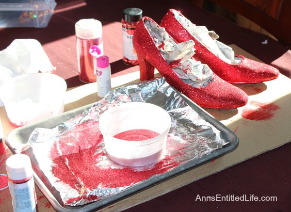 How To Easily Make Your Own Beautiful Ruby Glitter Slippers; ever wanted to own Dorthy from the Wizard of Oz Ruby Slippers? Well now you can make your own ruby slippers employing these simple step by step instructions. Using these easy how-to instructions you can make your own inexpensive, beautiful ruby red slippers with glitter and paint to for wear or for decor.  Also included, how to make your own glitter sneakers! You will love them!