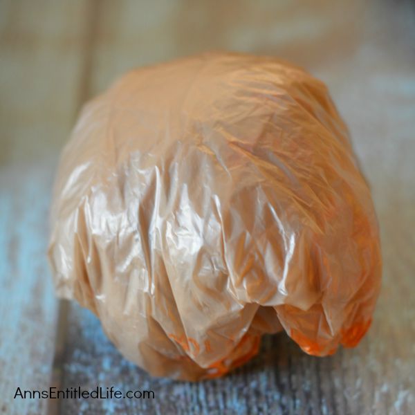 Easy DIY No-Sew Yarn Pumpkins; these No-Sew Yarn Wrapped Pumpkins are super easy to make, require no special crafting skills and are totally adorable. If you need a quick fall craft, or would like a (supervised) project for your children on a rainy weekend, these pumpkins are a terrific craft project.