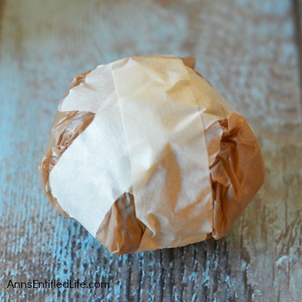 Easy DIY No-Sew Yarn Pumpkins; these No-Sew Yarn Wrapped Pumpkins are super easy to make, require no special crafting skills and are totally adorable. If you need a quick fall craft, or would like a (supervised) project for your children on a rainy weekend, these pumpkins are a terrific craft project.