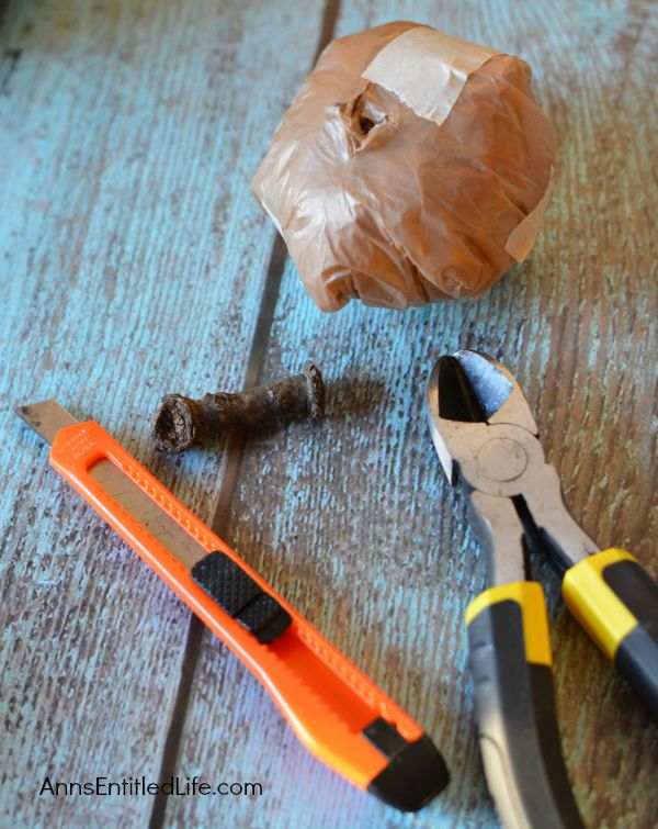 Easy DIY No-Sew Yarn Pumpkins; these No-Sew Yarn Wrapped Pumpkins are super easy to make, require no special crafting skills and are totally adorable. If you need a quick fall craft, or would like a (supervised) project for your children on a rainy weekend, these pumpkins are a terrific craft project.