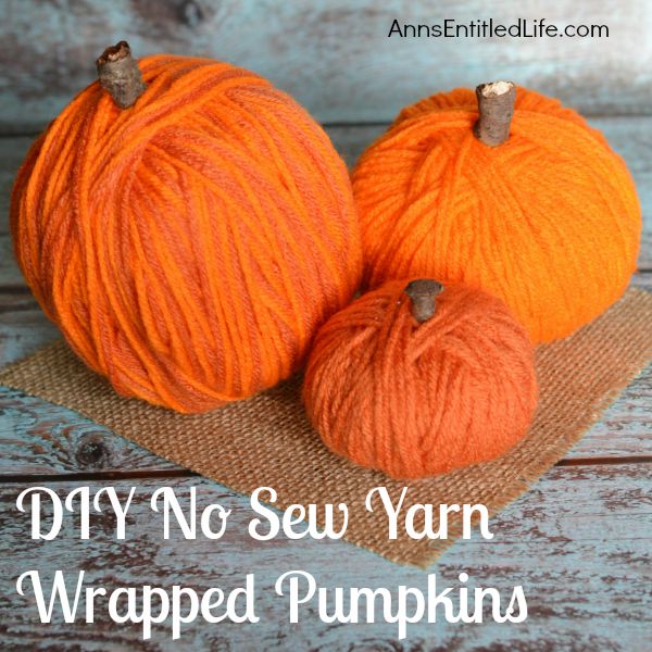 Easy DIY No-Sew Yarn Pumpkins; these No-Sew Yarn Wrapped Pumpkins are super easy to make, require no special crafting skills and are totally adorable. If you need a quick fall craft, or would like a (supervised) project for your children on a rainy weekend, these pumpkins are a terrific craft project.