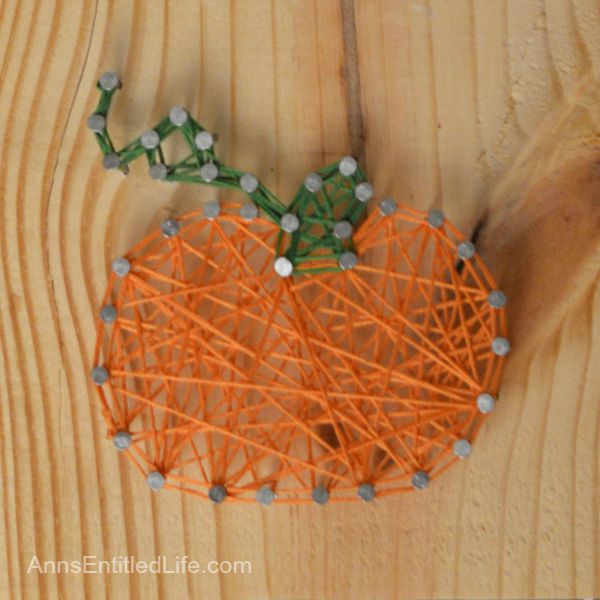 DIY Halloween String Art Trio: Ghost, Pumpkin and Bat; Halloween doesn't have to be spooktacular, sometimes it can be cute and whimsical. The ghost, pumpkin and bat in this string art project work well as a grown-up Halloween art project that is a touch fanciful.
