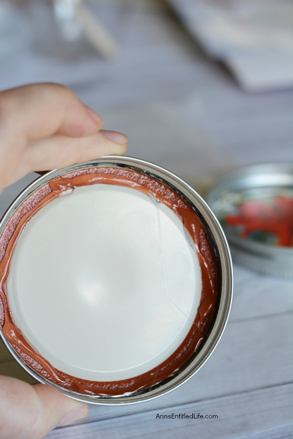 DIY Christmas Coasters. These DIY Christmas Coasters are cute and quite simple to make. This is a fantastic project to reuse old Christmas cards and to make a wonderful homemade gift for friends and family. These easy to make Christmas Coasters are unique, but usable. Plan ahead though because they do take time to cure.