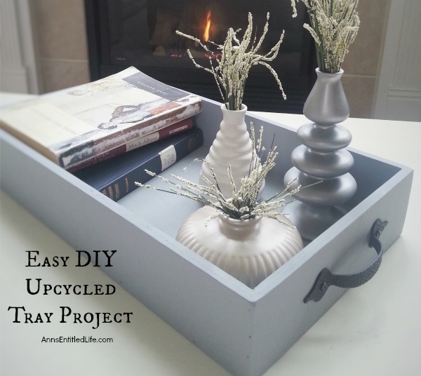 Easy DIY Upcycled Tray Project; Simply, quickly and inexpensively transform an old (or new) tray into a fabulous, multi-use, accent decor piece with these simple step by step instructions.
