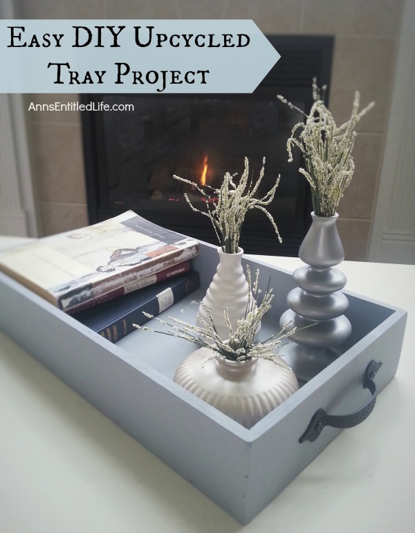 Easy DIY Upcycled Tray Project; Simply, quickly and inexpensively transform an old (or new) tray into a fabulous, multi-use, accent decor piece with these simple step by step instructions.