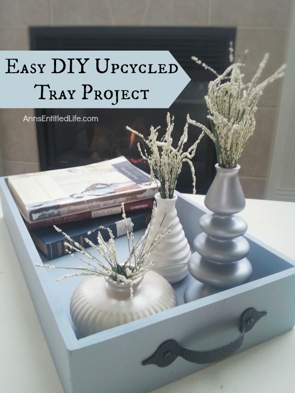 Easy DIY Upcycled Tray Project; Simply, quickly and inexpensively transform an old (or new) tray into a fabulous, multi-use, accent decor piece with these simple step by step instructions.