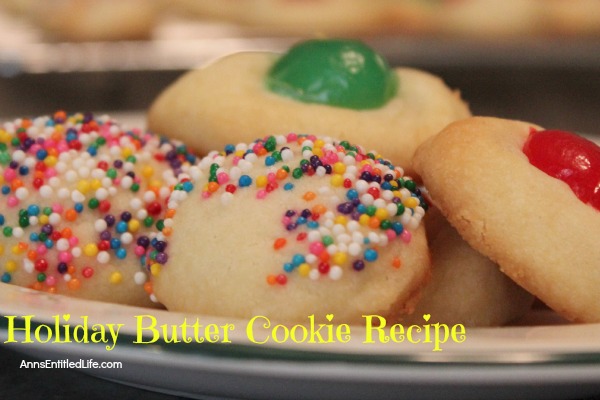 Holiday Butter Cookie Recipe; these simple, four ingredient Holiday Butter Cookies are absolutely delicious! They can be decorated with nuts, sprinkles, cherries and more. You are only limited by your imagination.