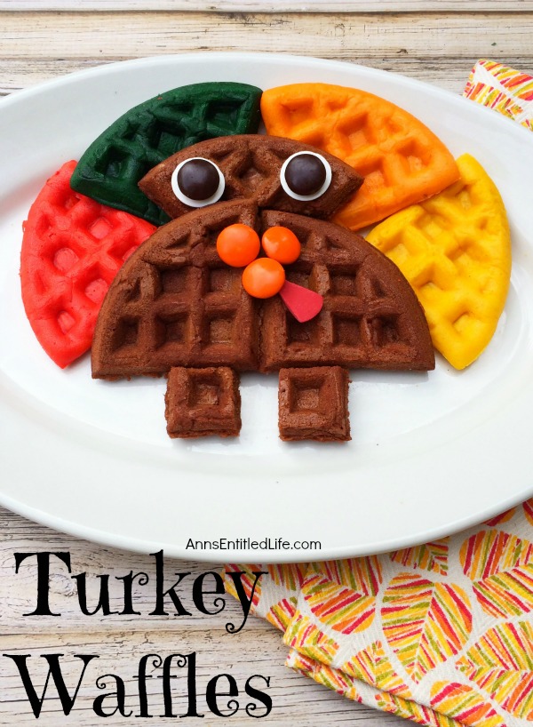 colored waffle in the shape of a turkey on a white plate