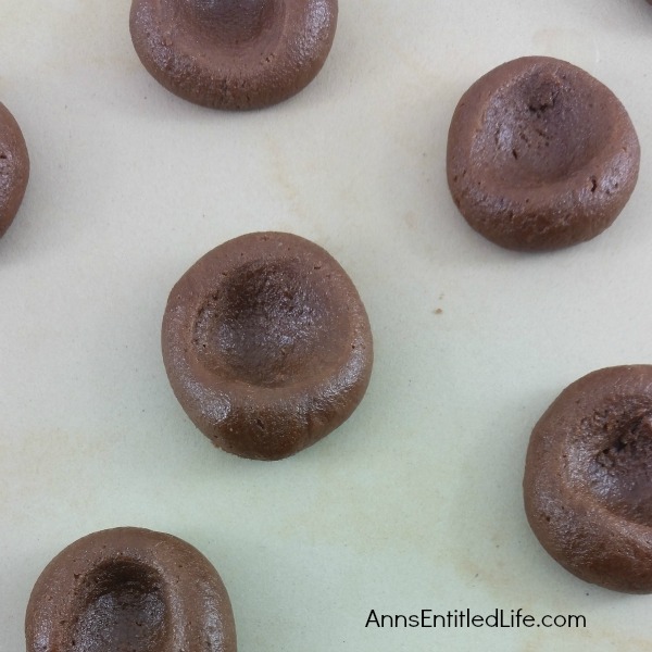 Chocolate Caramel Thumbprint Cookies Recipe. If you like thumbprint cookies, you will love this delicious update to that old classic recipe. These chocolate caramel thumbprint cookies combine the rich taste of chocolate with the smooth taste of caramel for a truly decadent cookie!