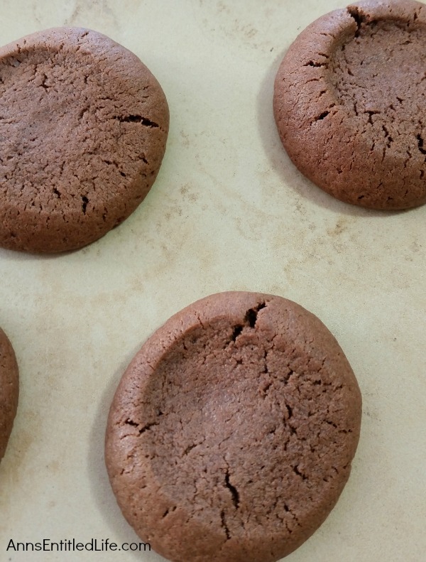 Chocolate Caramel Thumbprint Cookies Recipe. If you like thumbprint cookies, you will love this delicious update to that old classic recipe. These chocolate caramel thumbprint cookies combine the rich taste of chocolate with the smooth taste of caramel for a truly decadent cookie!