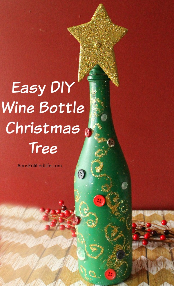 Easy DIY Wine Bottle Christmas Tree. An empty wine bottle, some glitter, paint and glue combined with a little imagination easily transforms into a pretty holiday decoration! Upcycle your empty wine bottles to make a lovely Christmas Tree decoration. Make one or make a grouping to form a centerpiece, mantel decoration, or unique side table decor.