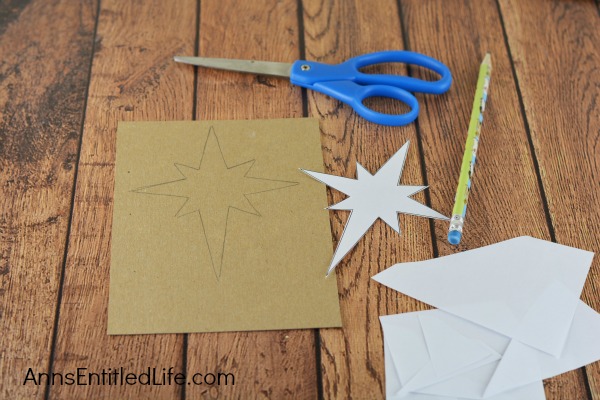 Evening Star Christmas Wall Hanging. A beautiful piece of wall art for the holidays. This Evening Star Christmas wall hanging is simple and inexpensive to make. Give it as a gift or display it in your own home this holiday season.