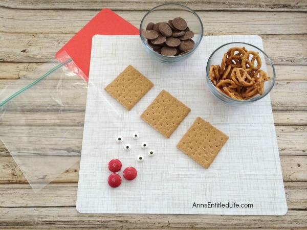 Reindeer Grahams Cookie Recipe. A super simple cookie recipe you can make with your children or grandchildren. These Reindeer Grahams are an adorable, tasty and just plain fun holiday treat!