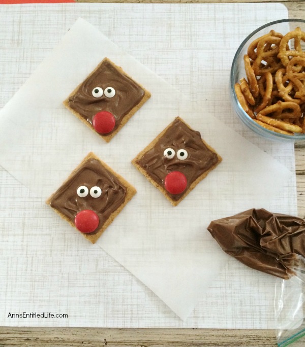 Reindeer Grahams Cookie Recipe. A super simple cookie recipe you can make with your children or grandchildren. These Reindeer Grahams are an adorable, tasty and just plain fun holiday treat!