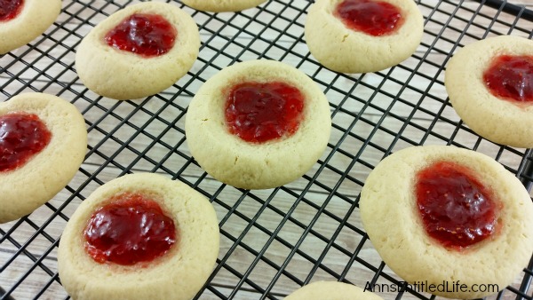 Thumbprint Cookies Recipe. A classic holiday cookie recipe, these Thumbprint cookies are easy to make. Buttery rich, jam sweet, these classic thumbprint cookies are melt in your mouth delicious.