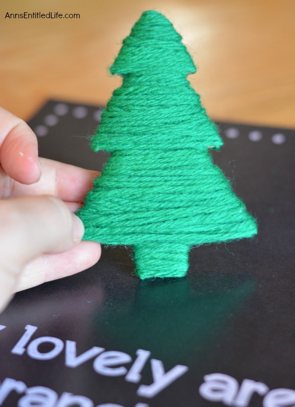 O Christmas Tree Wall Hanging. An adorable piece of wall art for the holidays. This O Christmas Tree wall hanging is simple and inexpensive to make. Give it as a gift or display it in your own home this holiday season.