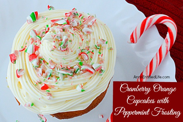 Cranberry Orange Cupcakes with Peppermint Frosting. Jazz up a plain boxed cake mix for a festive holiday treat! These easy to make cupcakes and simple peppermint frosting recipe will make people think you slaved all day in the kitchen, instead of just minutes.  These fun and delicious Cranberry Orange Cupcakes with Peppermint Frosting are a wonderful holiday dessert.