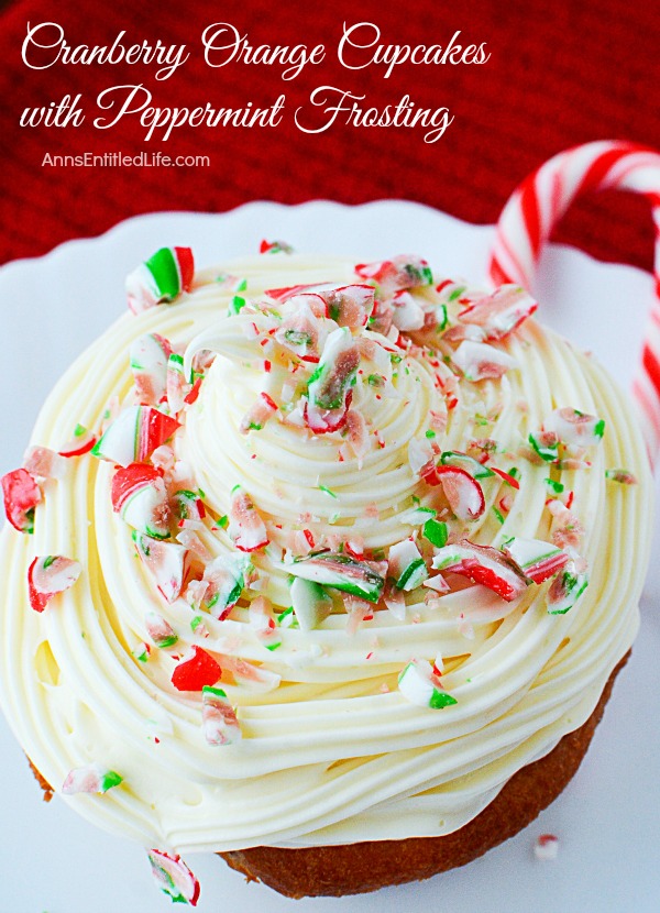 Cranberry Orange Cupcakes with Peppermint Frosting. Jazz up a plain boxed cake mix for a festive holiday treat! These easy to make cupcakes and simple peppermint frosting recipe will make people think you slaved all day in the kitchen, instead of just minutes.  These fun and delicious Cranberry Orange Cupcakes with Peppermint Frosting are a wonderful holiday dessert.