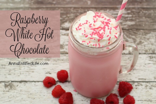 Raspberry White Hot Chocolate Recipe. Snuggle up this winter with a cup of Raspberry White Hot Chocolate  made from scratch. A delicious update to traditional hot chocolate, this yummy mixture will warm you up inside.