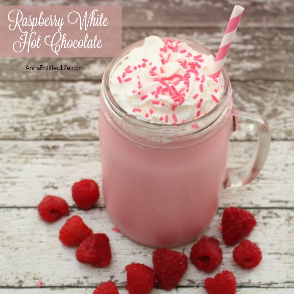 Raspberry White Hot Chocolate Recipe. Snuggle up this winter with a cup of Raspberry White Hot Chocolate  made from scratch. A delicious update to traditional hot chocolate, this yummy mixture will warm you up inside.