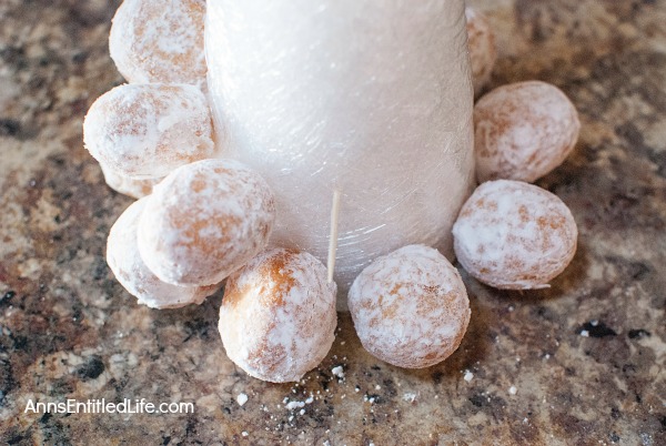 Donut Hole Tree. Make an adorable Donut Hole Tree for your next holiday party, Christmas breakfast, or other special occasion. This donut hole tree can be made all year, but is especially festive during the holiday season!