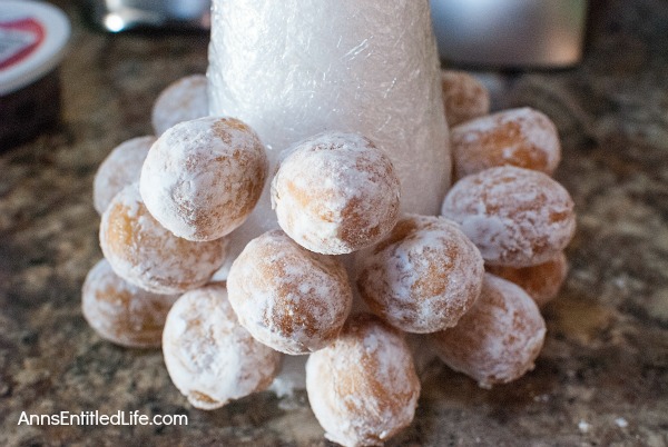 Donut Hole Tree. Make an adorable Donut Hole Tree for your next holiday party, Christmas breakfast, or other special occasion. This donut hole tree can be made all year, but is especially festive during the holiday season!