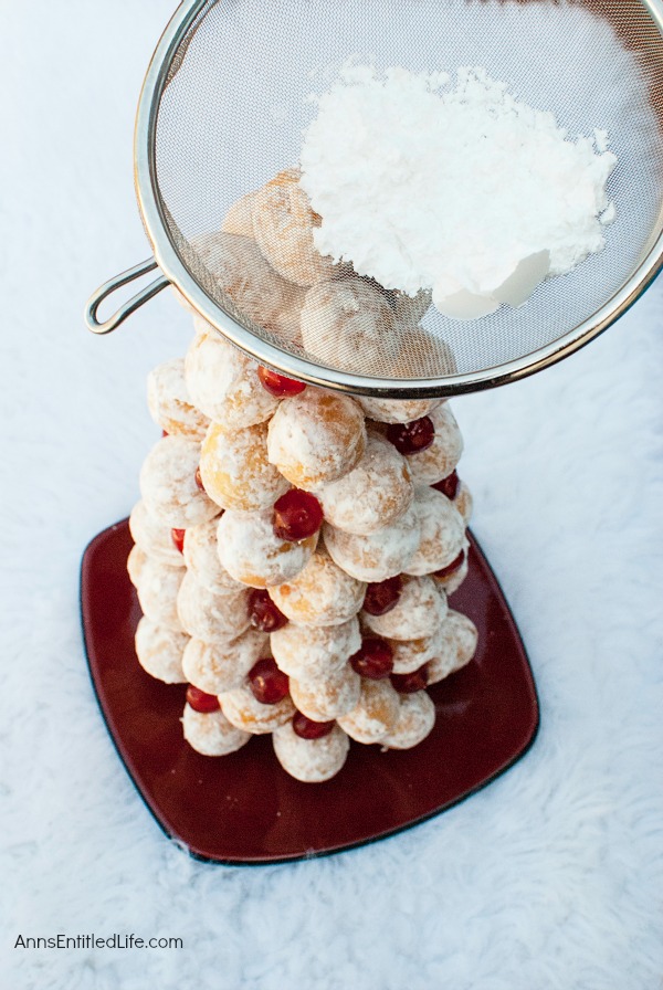 Donut Hole Tree. Make an adorable Donut Hole Tree for your next holiday party, Christmas breakfast, or other special occasion. This donut hole tree can be made all year, but is especially festive during the holiday season!