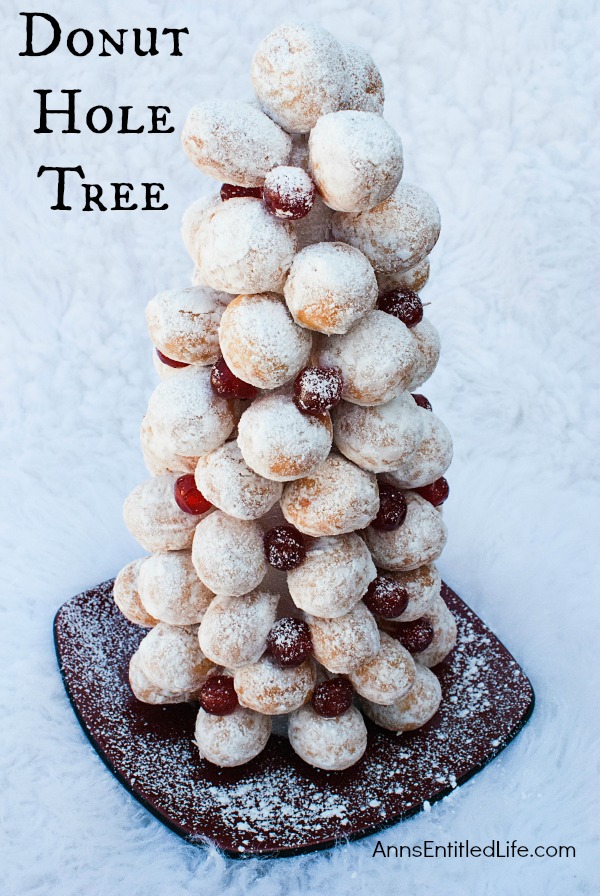 Donut Hole Tree. Make an adorable Donut Hole Tree for your next holiday party, Christmas breakfast, or other special occasion. This donut hole tree can be made all year, but is especially festive during the holiday season!