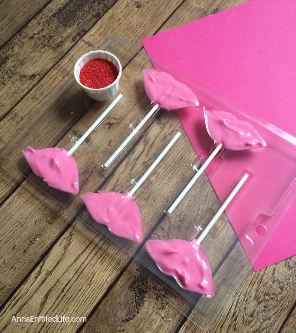 Lip Pops Recipe. Make your own Lip Pops quickly, easily and inexpensively using this step by step tutorial. Whether for a bridal shower, wedding favor or Valentine's Day treat, these simple to make, delicious lip pops are a wonderful cherry-chocolaty sweet.