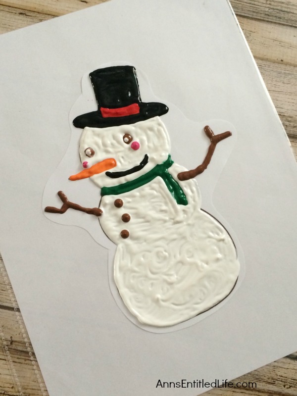 Make Your Own Snowman Window Cling. Looking for a fun project to make with your children or grandchildren this winter? How about window clings!? Make your own snowman window clings using these easy step by step directions. This is a great activity to beat winter boredom, when someone has the sniffles, or to just decorate your windows for winter!