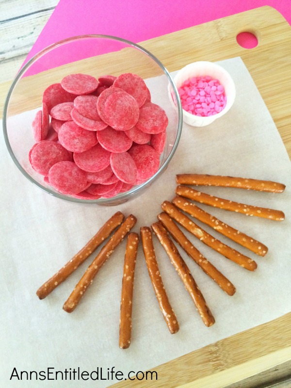 Easy Heart Pretzel Recipe. These 3 ingredient, adorable Heart Pretzels are easy to make! Wrap them up for school treats, or serve to friends and family as a special snack! Everyone will love these Easy Heart Pretzels.