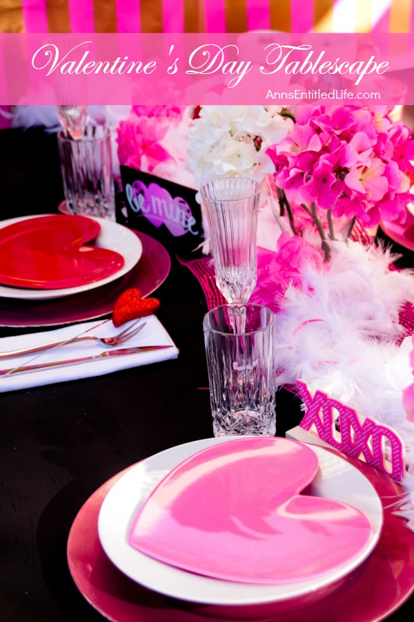 Valentine's Day Tablescape. Hosting a Valentine's Day Dinner? Dressing up the table for Valentine's Day?  This beautiful Valentine holiday tablescape features white, red and pink. A lovely bold theme to compliment your delicious dinner.