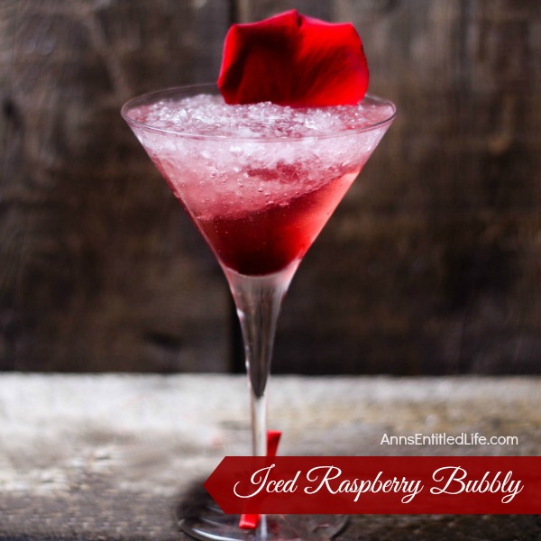 Iced Raspberry Bubbly Recipe. A beautiful update on a classic drink, this Iced Raspberry Bubbly Recipe combines the subtle taste of hibiscus with the bold taste of raspberry and mint for a truly delicious cocktail.